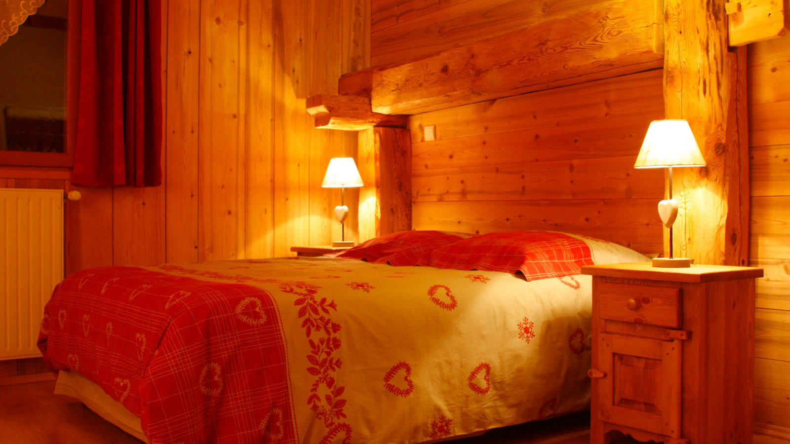 double bed and wood walls