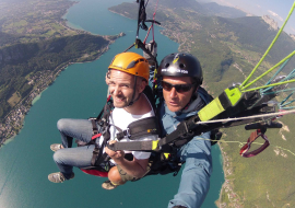 Instructional paragliding flight with instructor above lake Annecy