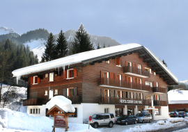 Hôtel Eliova l'Eau Vive sous la neige à Châtel l'hiver au Linga