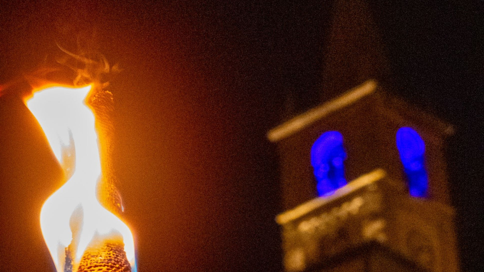 Torch under the bell tower