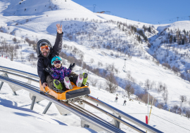 One father and his son on the sledge