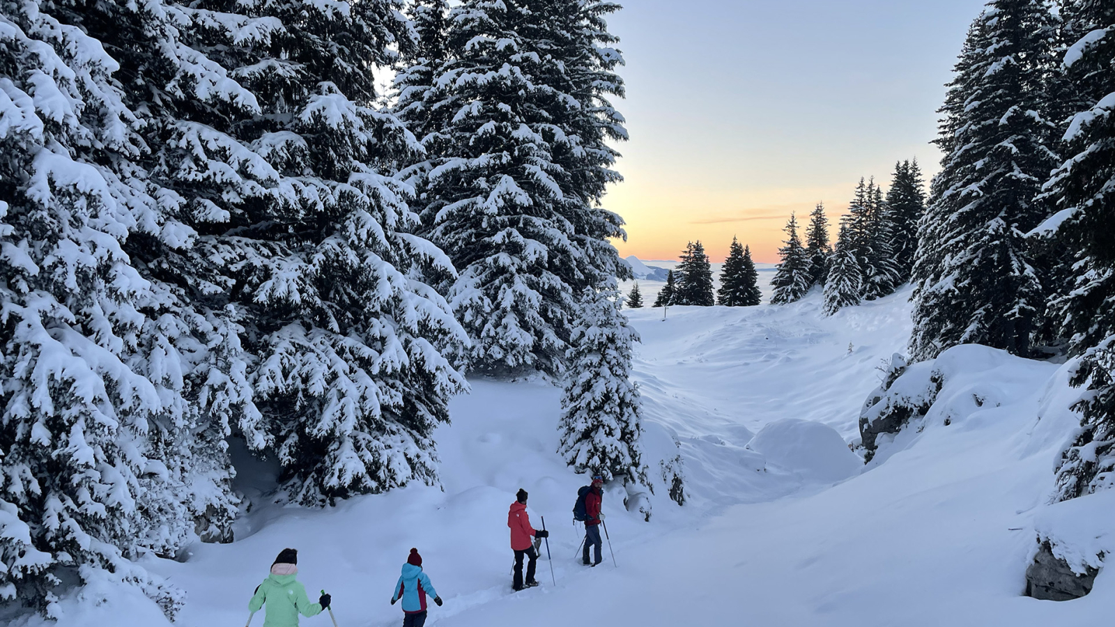 Snowshoeing at sunset