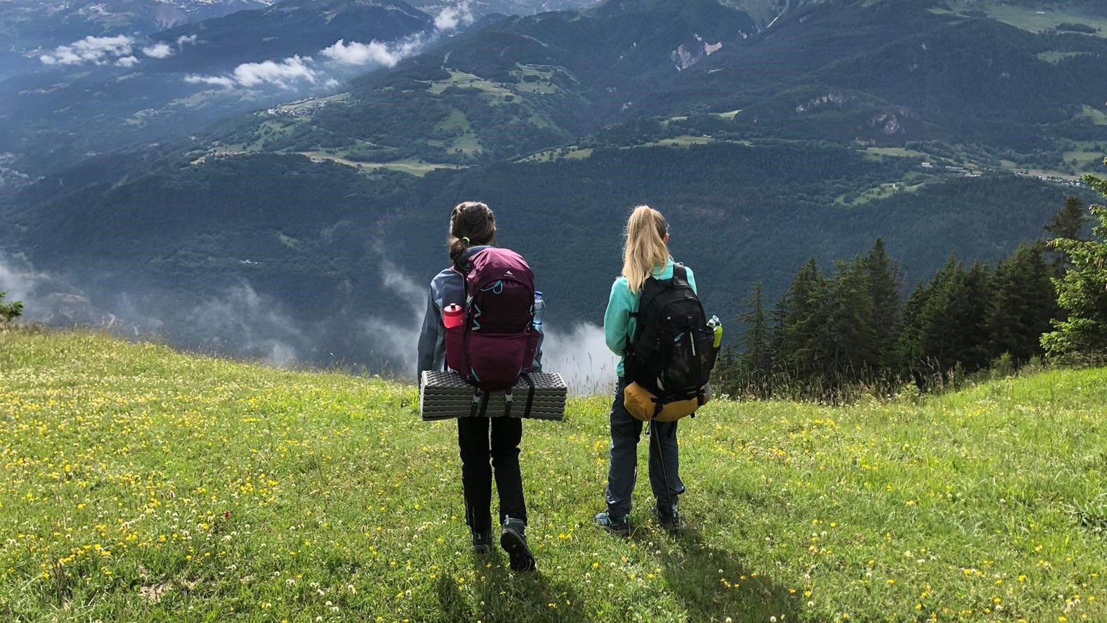 2 hikers enjoy the scenery