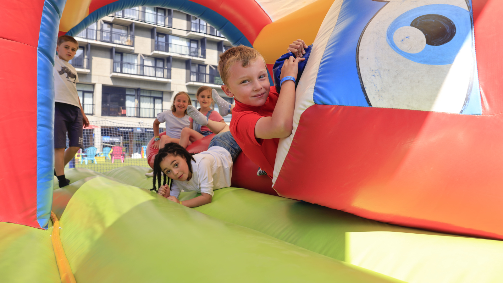 Group of children on the bouncy castles