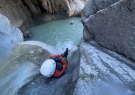 Practitioner sliding into a basin