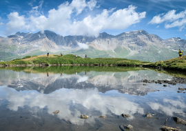 Competitors around a high-altitude lake