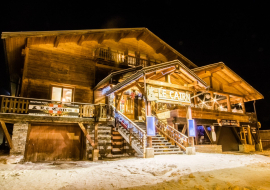 Exterior winter view of the Cairn restaurant in La Norma