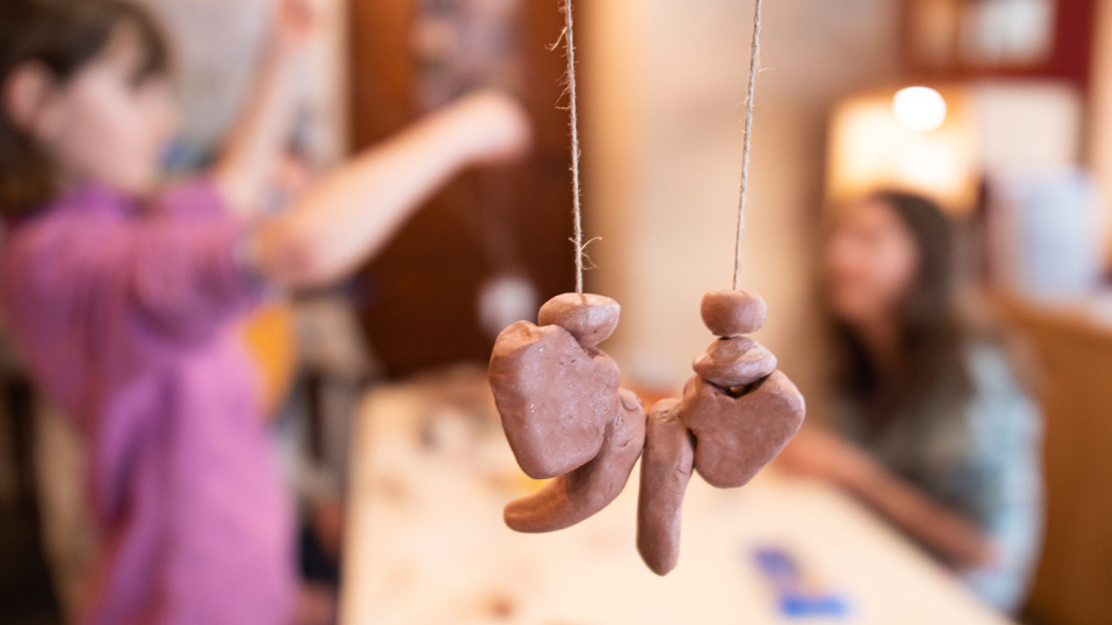 Children making beads