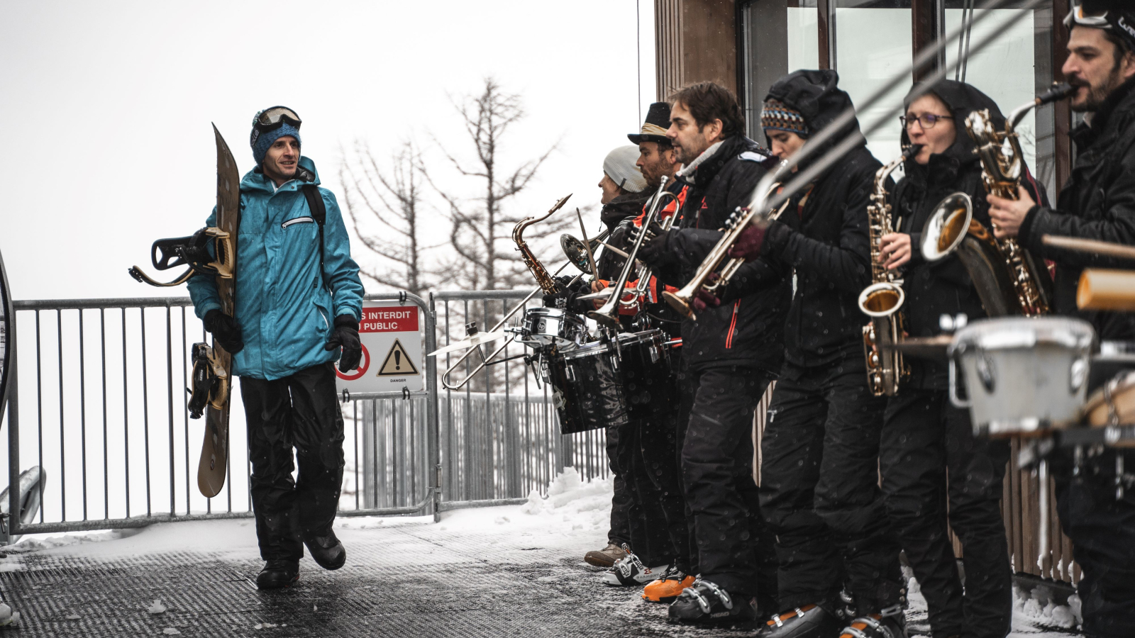 A brass band welcomes skiers