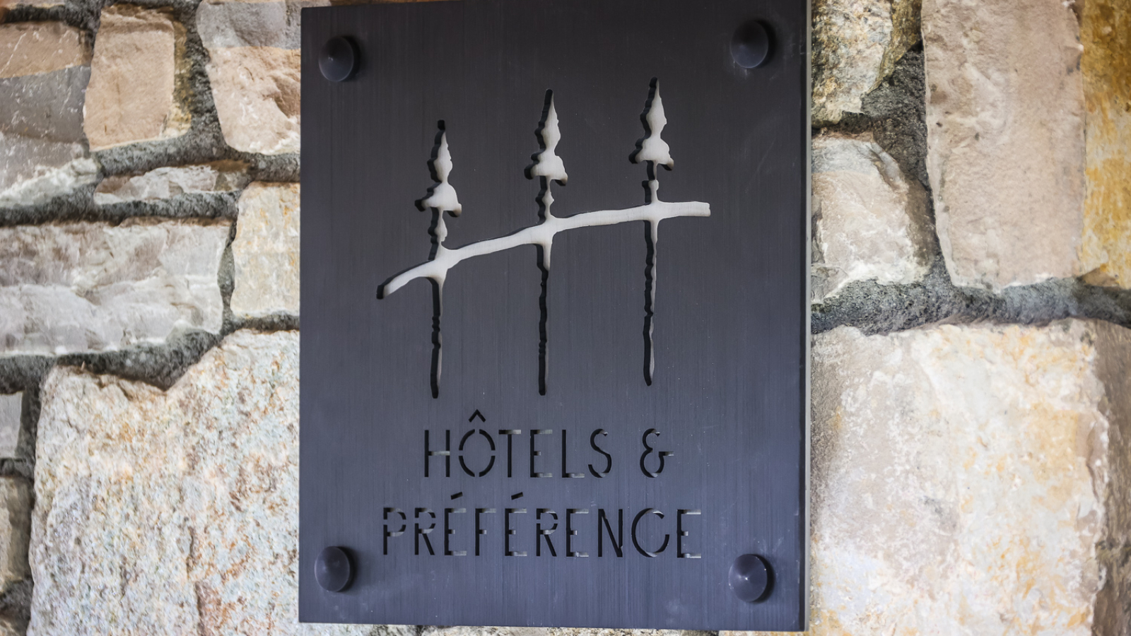 Chalet Hotel sign