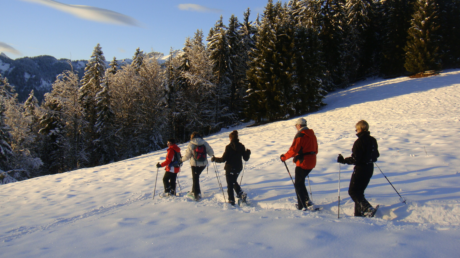 Snowshoeing at sunset