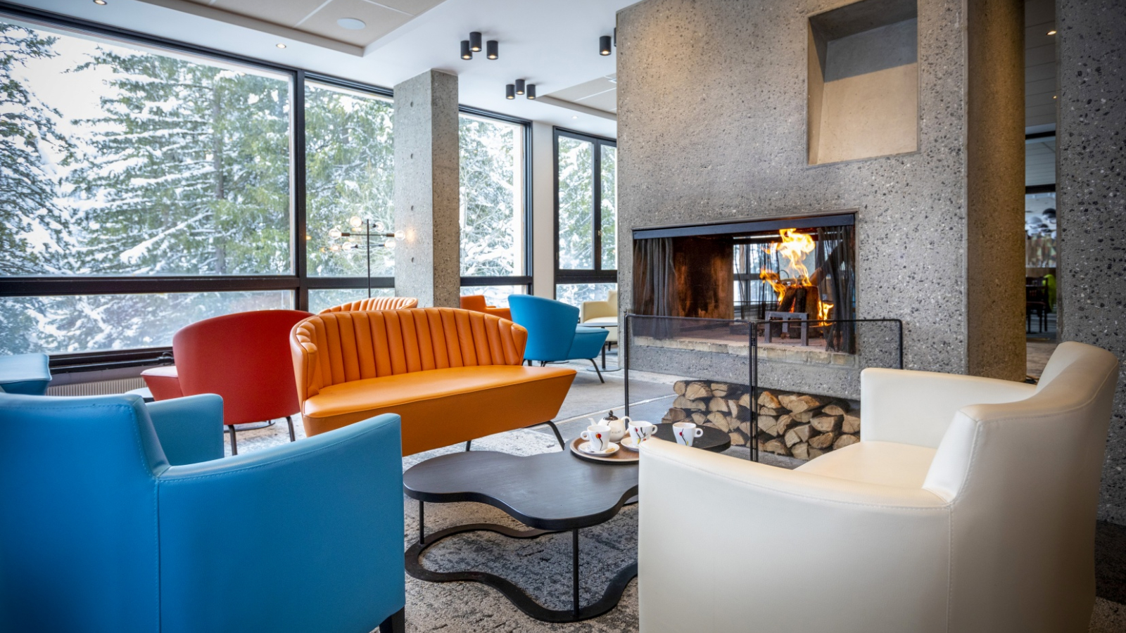 The bar room with its comfortable armchairs and fireplace